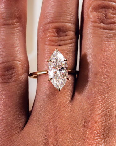 Twisted Marquise Cut Moissanite Ring In 18K Rose Gold | Fascinating Diamonds